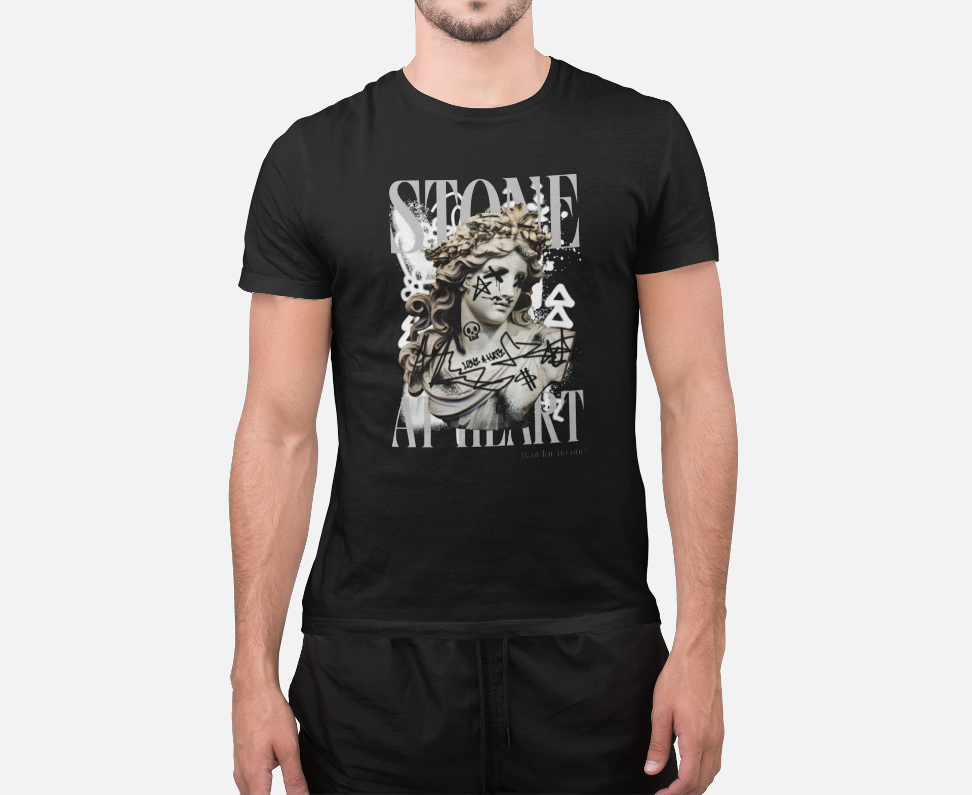 t-shirt-mockup-of-a-man-standing-at-a-studio-2367-el1-114