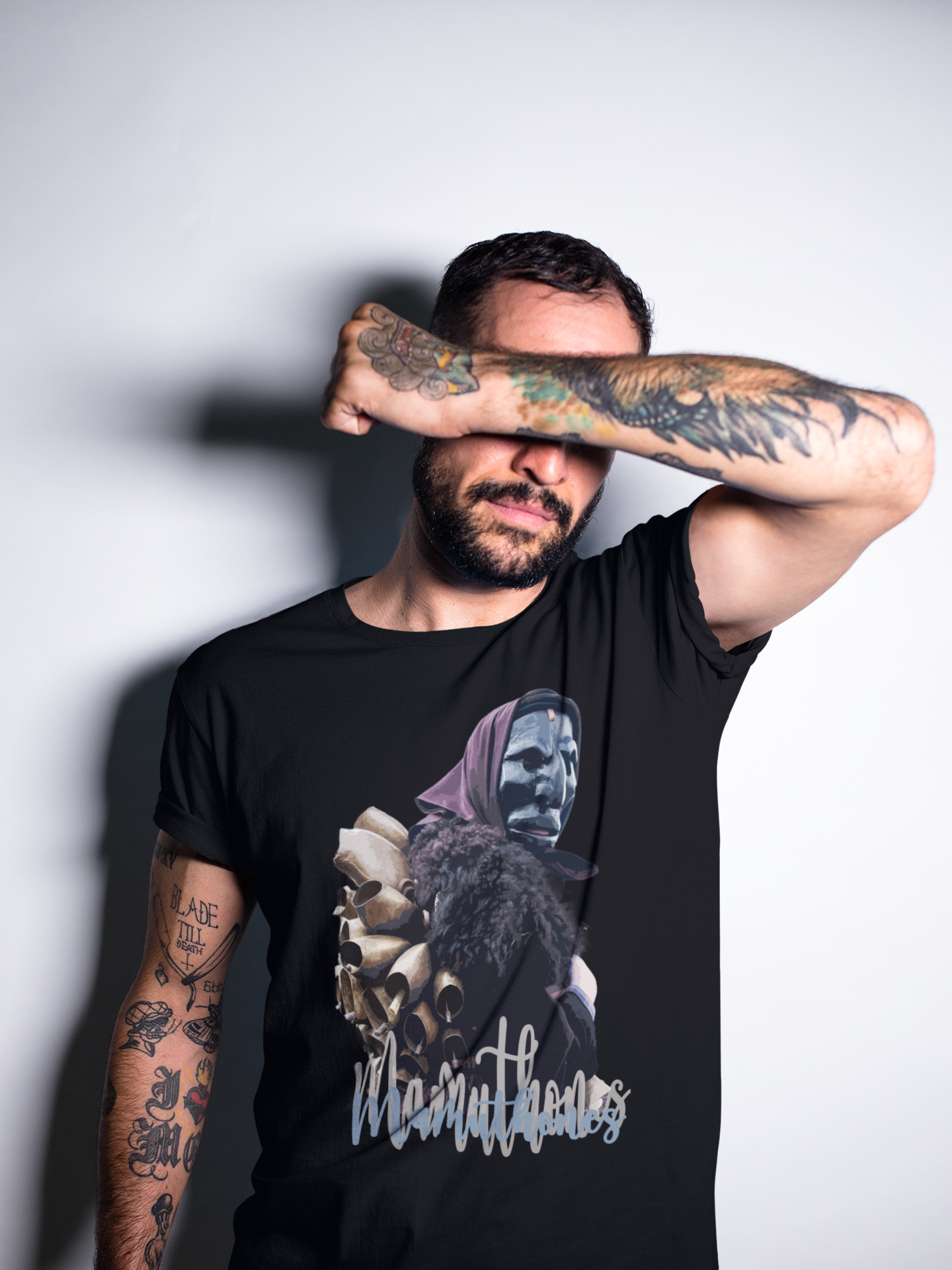 tattooed-man-covering-his-face-while-wearing-a-t-shirt-mockup-a17025